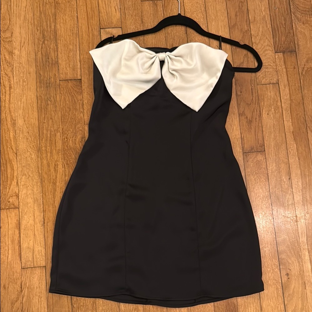 Elegant Black Dress with White Bow